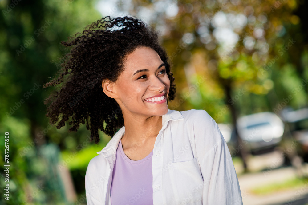 Photo of adorable carefree lady wear white shirt enjoying warm wind blowing sunny weather outside urban city park Photo of adorable carefree lady wear white shirt enjoying warm wind blowing sunny weather outside urban city park