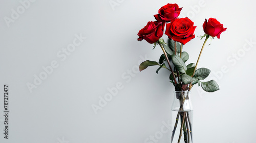 photo of roses in a glass vase on a white background, in the style of minimalism, copy space concept