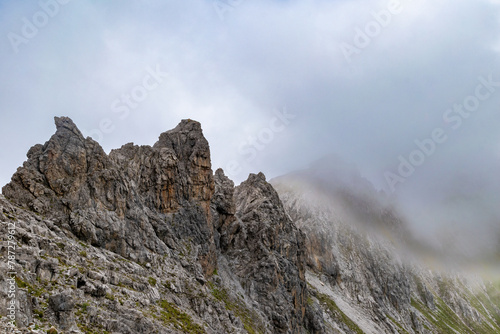 Clouds Over the Rugged Cliffs and Steep Slopes of Gamsluggen by Lünersee