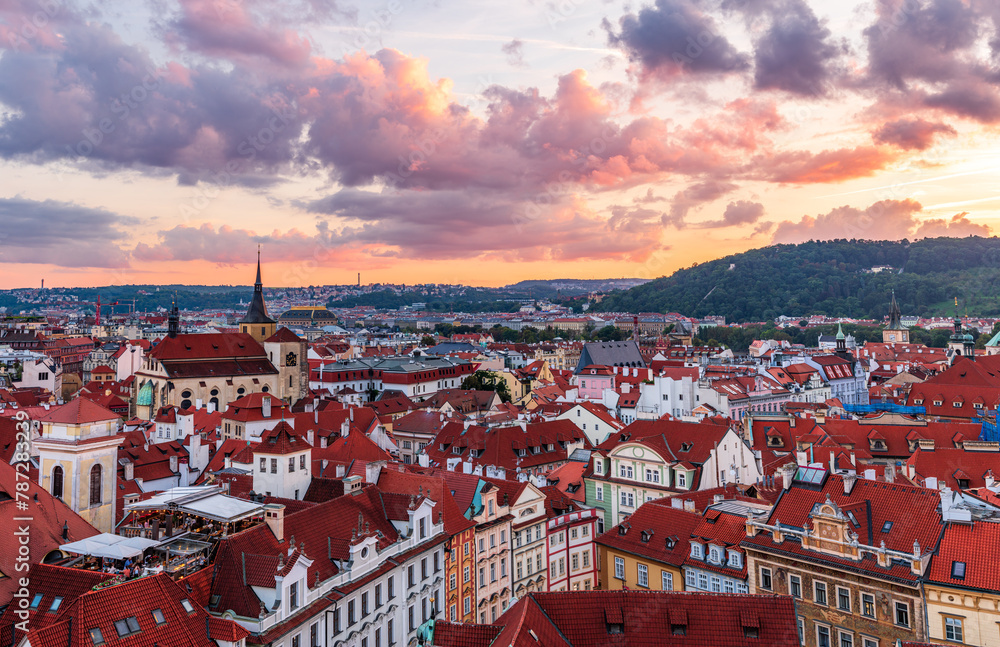 The aerial view of UNESCO site Prague cityscape of old town in sunset and colorful clouds.