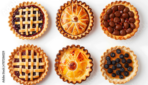 Set of different tasty pies on white background, top view