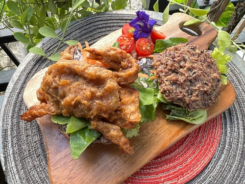 Crispy fried soft shell crab with rice berry burger