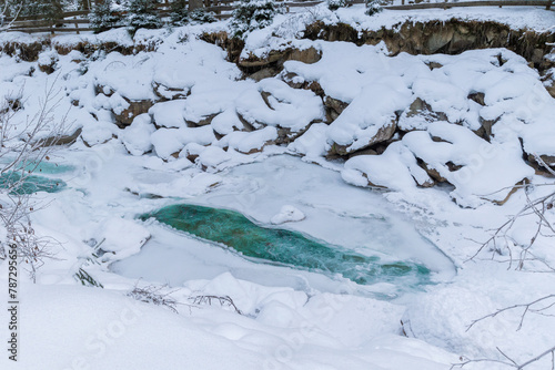 frozen river in the mountains (Krimml, Austria)