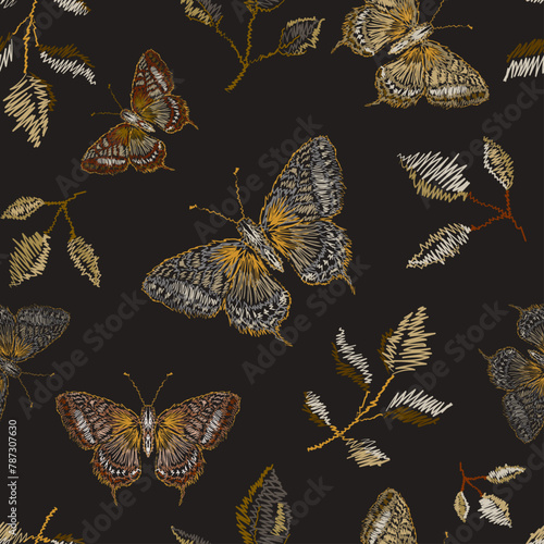 seamless pattern with butterflies . Leaves and butterflies  with black background .Embroidery colorful pattern . 