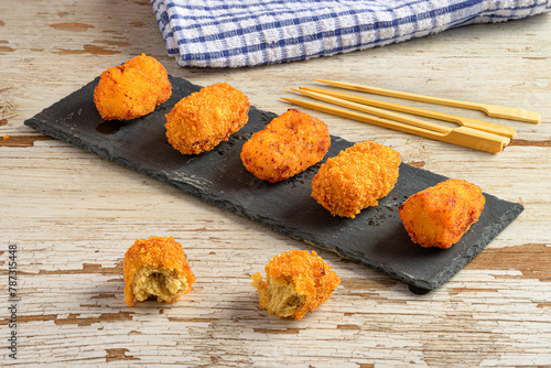 Delights of Croquettes on Black Slate