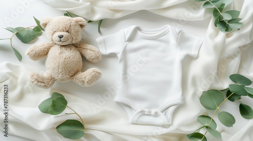 Baby bodysuit mockup with teddy bear and eucalyptus on ivory blanket throw, infant onesie template
