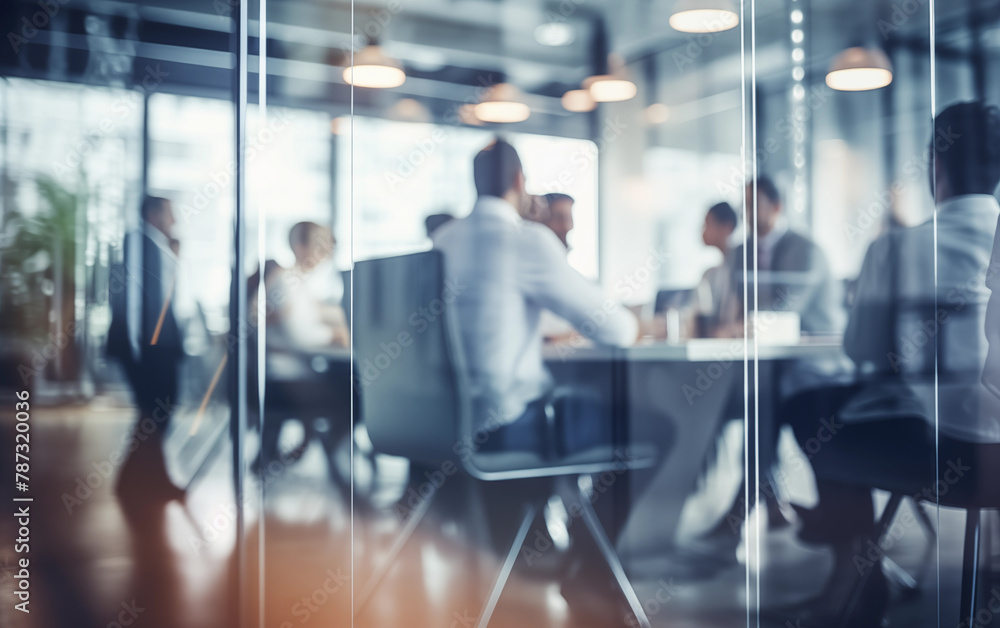 Office Workspace with Glass Partition and Blurred Workers - Professional Environment, Corporate Setting, Privacy Concept. Office Workspace with Glass Partition and Blurred Workers - Professional Environment, Corporate Setting, Privacy Concept.