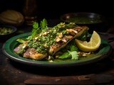 grilled fish on a plate with green chiles
