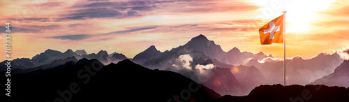 Schweizer Bergpanorama mit Schweizr Nationalflagge photo