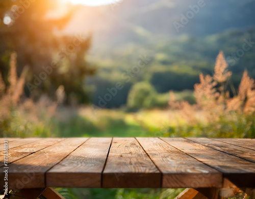 Beautiful nature background and with an empty wooden table on nature outdoors in sunlight 