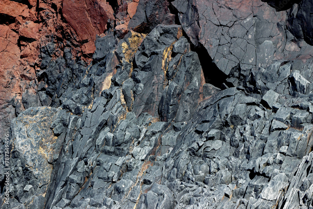 detail of natural volcanic basalt stone cliff in Iceland detail of natural volcanic basalt stone cliff in Iceland