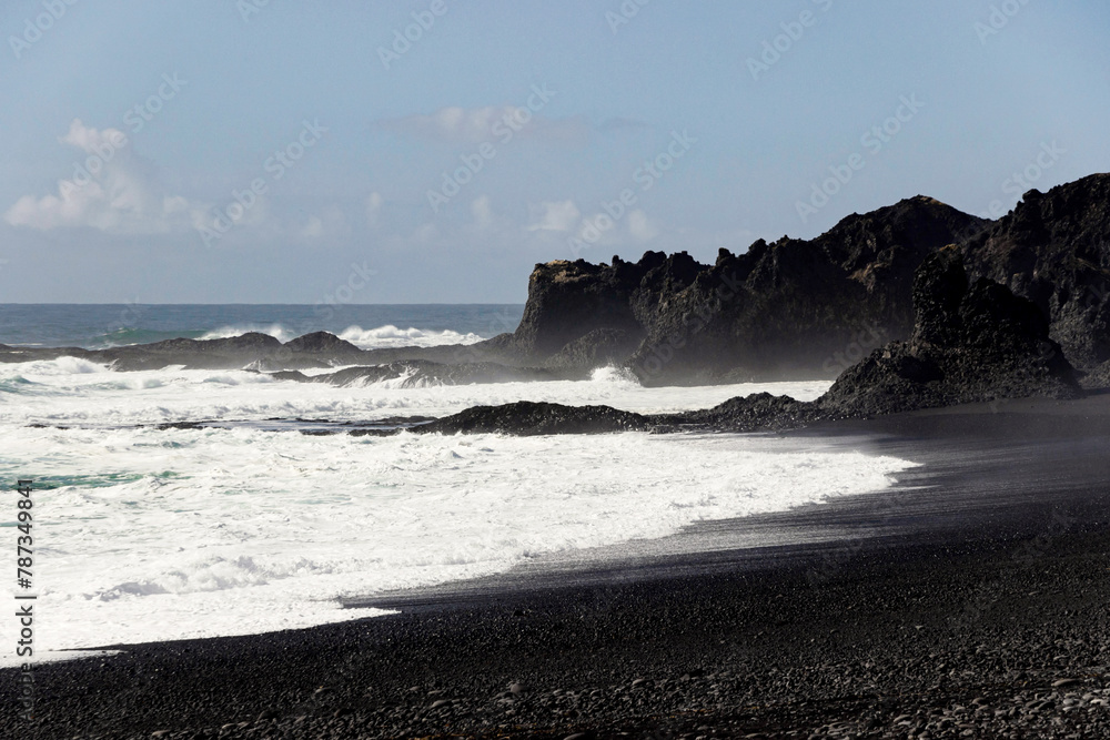 waves on shore at south coast black beach in Iceland