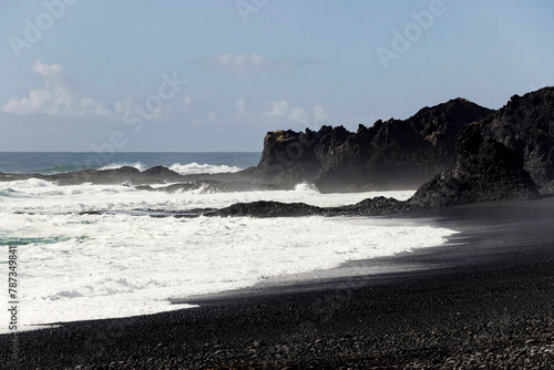 waves on shore at south coast black beach in Iceland