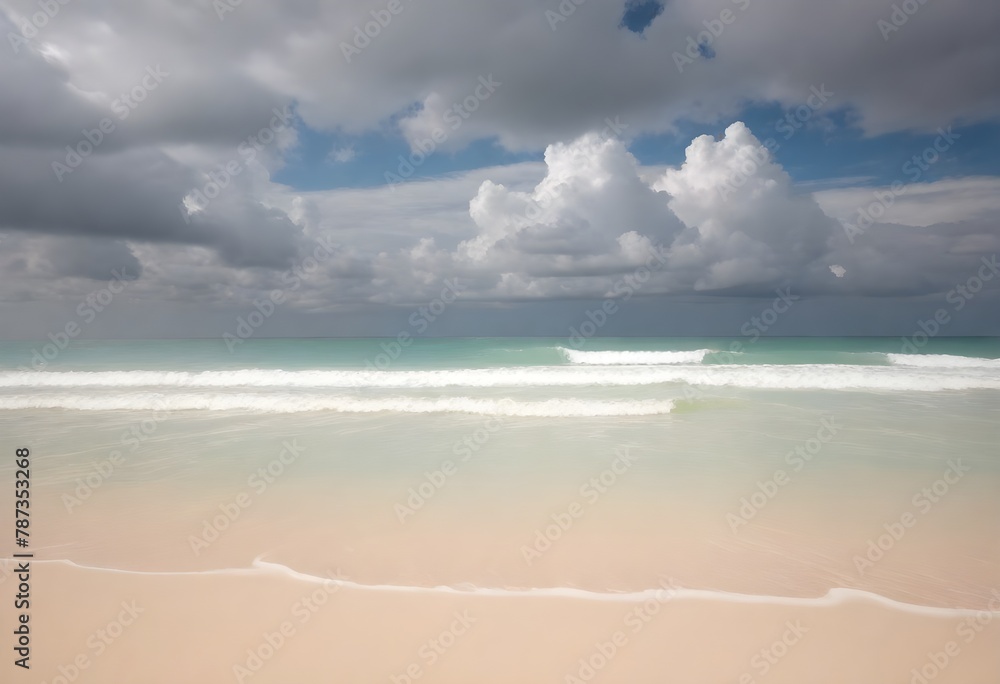 Sandy beach with gentle waves and a cloudy sky