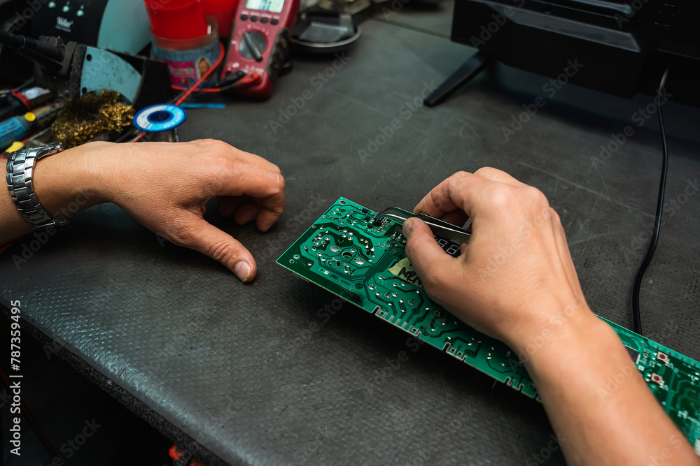 Obraz premium Service for repairing electrical devices.