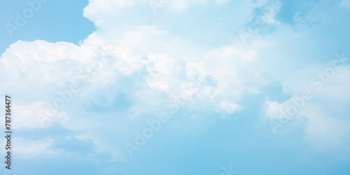 It's a hot day with the sun shining down on a blue sky filled with alternating small and huge clouds moving gently while the light from the sky creates a remarkable abstract shape. Horizon, Cloud Back