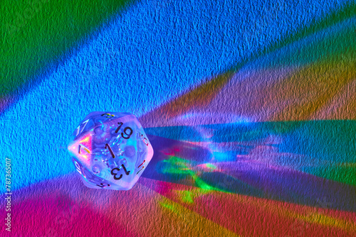 Prismatic D20 Dice on Textured Rainbow Canvas, Macro View