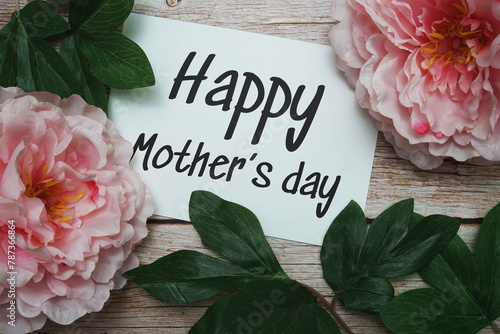 Happy Mothers day typography text on wooden background