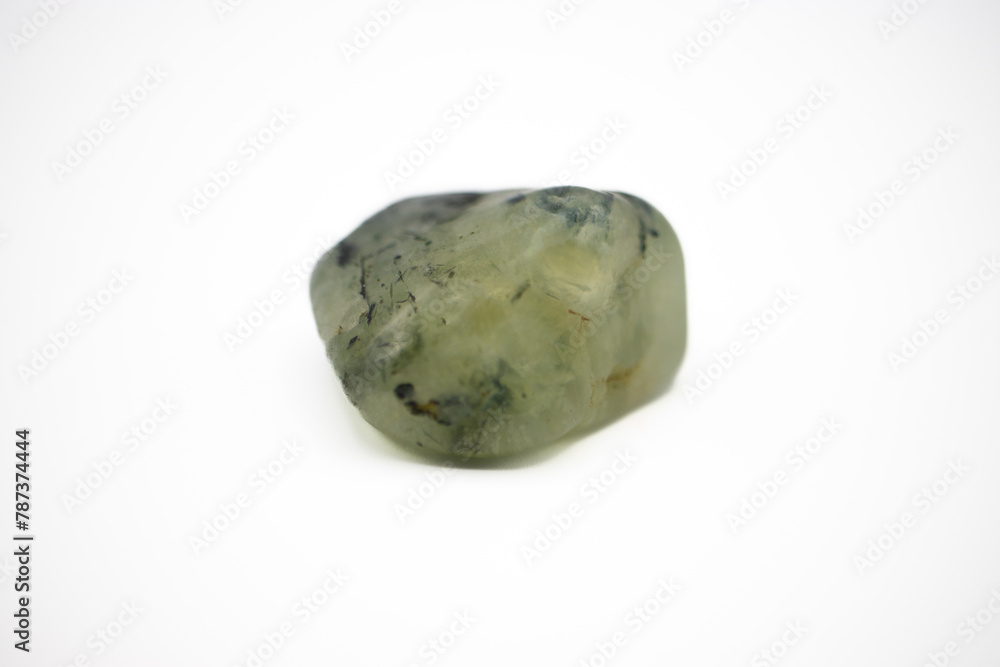 Prehnite is a green or yellowish silicate mineral that grows in little globes in volcanic rocks or sometimes as stalactites clinging like icicles to the roof of caves. Prehnite is a green or yellowish silicate mineral that grows in little globes in volcanic rocks or sometimes as stalactites clinging like icicles to the roof of caves.