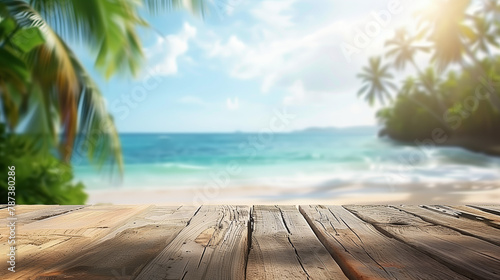 Beautifully blurred background of an empty wooden table with copy space and a beautiful view from the window to a tropical beach with white sand, blue water and palm trees on a sunny day.
