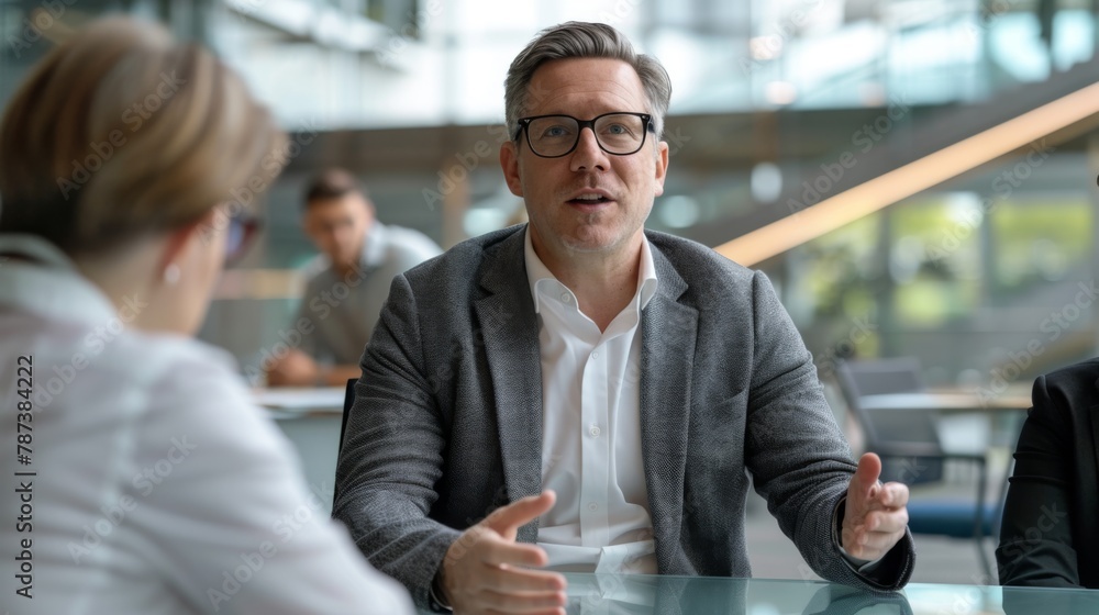 Confident Businessman in Meeting. Confident Businessman in Meeting.