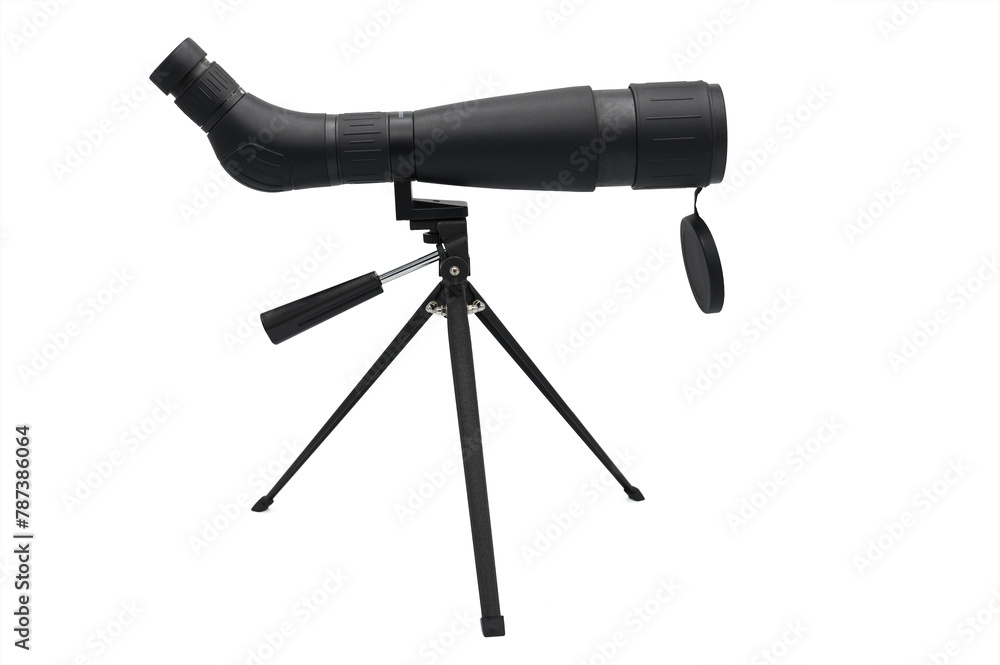 Side view of small, lightweight spotting scope mounted on tripod. Used to view the dianba at the shooting range Side view of small, lightweight spotting scope mounted on tripod. Used to view the dianba at the shooting range
