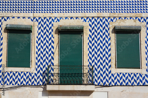 Geometric Pattern of Azulejo Tiles on Wall of a Old Building in Lisbon, Portugal.