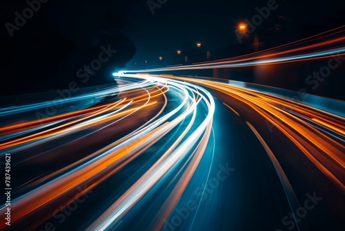 Bright light trails bending on a highway