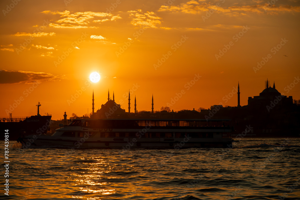 Fototapeta premium Silhouette of City of Istanbul, Sunset Time, View of Bosphorus, Showing of Blue Mosque and Hagia Sofia