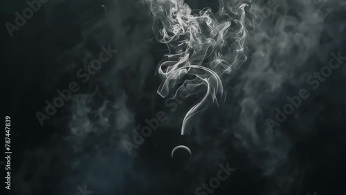 The question mark formed by smoke on a dark background stands out clearly without blending into the darkness, creating an intriguing visual contrast. photo