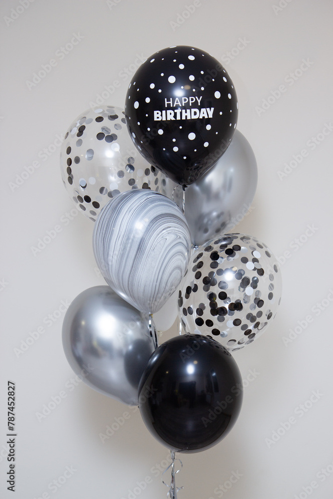 a bunch of black and silver balloons for a man on a white background a bunch of black and silver balloons for a man on a white background