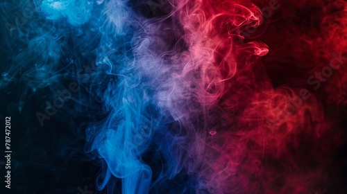 Dramatic artificial smoke illuminated by red and blue lights against a dark background  creating a mysterious ambiance
