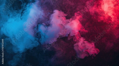 Dramatic artificial smoke illuminated by red and blue lights against a dark background, creating a mysterious ambiance