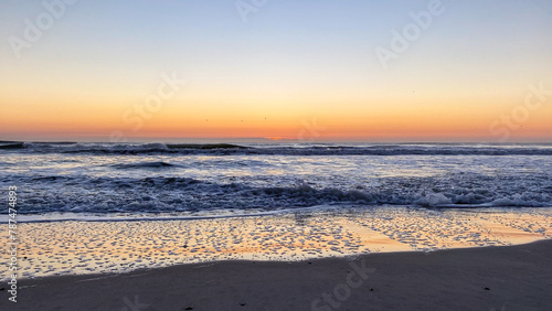 Fototapeta Naklejka Na Ścianę i Meble -  Ocean Waves on American Beach in Amelia Island Florida at Sunrise