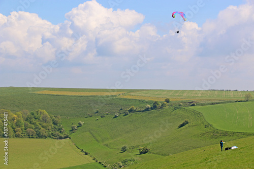 Paragliders flying from Monksdown in Wiltshire