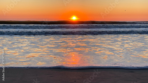 Fotografie Ocean Waves on American Beach in Amelia Island Florida at Sunrise