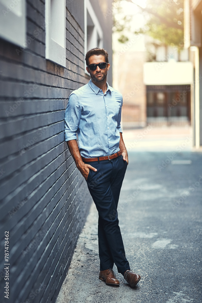 Man, pride and property in street with sunglasses for fashion, style and trendy in outdoor. Male person, real estate and agent in town for work, corporate or career in mens wear in city background Man, pride and property in street with sunglasses for fashion, style and trendy in outdoor. Male person, real estate and agent in town for work, corporate or career in mens wear in city background