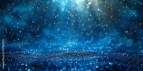 Water droplets on a vibrant blue surface, reflecting light, creating a serene and calming atmosphere.