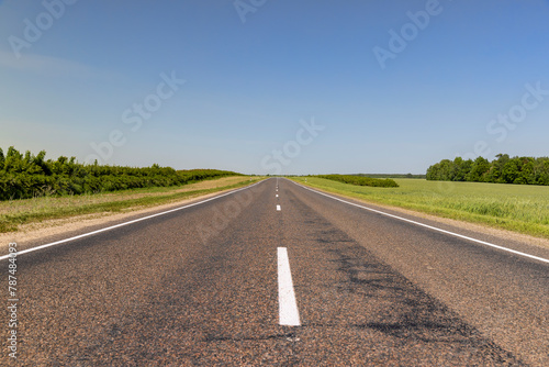 paved road with white line markings © rsooll