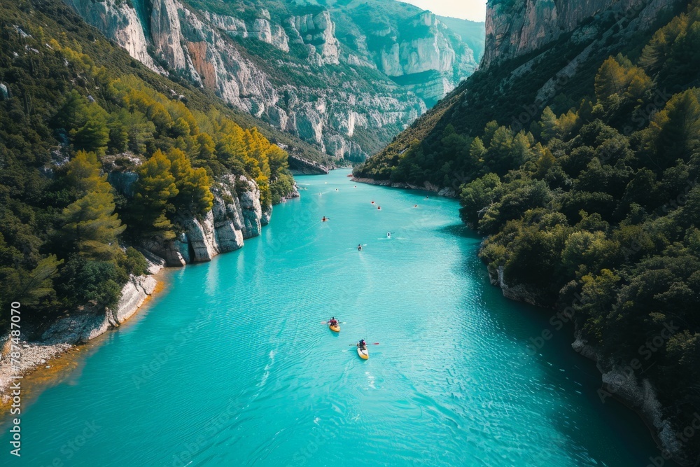 Group of People Kayaking Down River