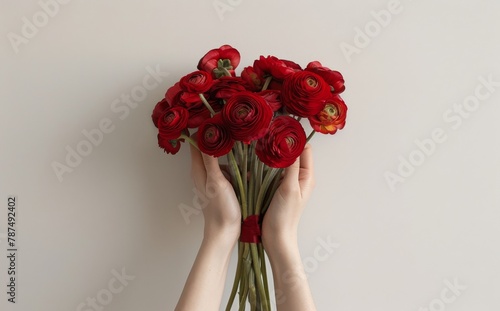Person Holding Bunch of Red Flowers