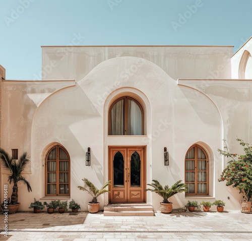 Large Building With Abundant Plants in Front