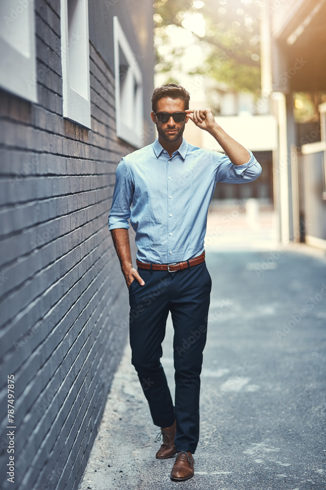 Stylish, businessman and confident in street as property agent for fashion, edgy and trendy in outdoor. Male person, pride and real estate for work, corporate or career in mens wear in New York City