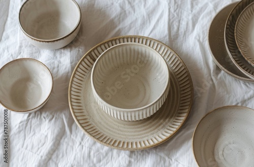 Group of Bowls on White Sheet
