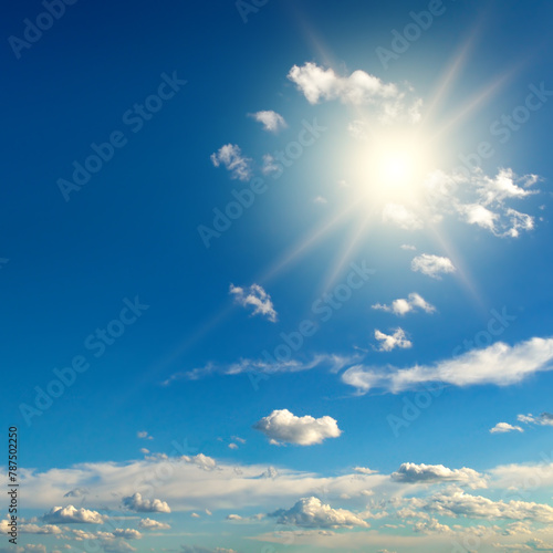 Bright sun on blue sky with beautiful clouds