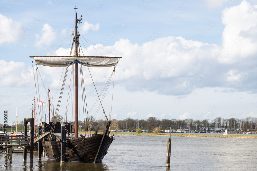 Replica of an old merchant ship -Kamper Kogge, along the river IJssel near the Dutch historic Hanseatic city of Kampen in Overijssel.