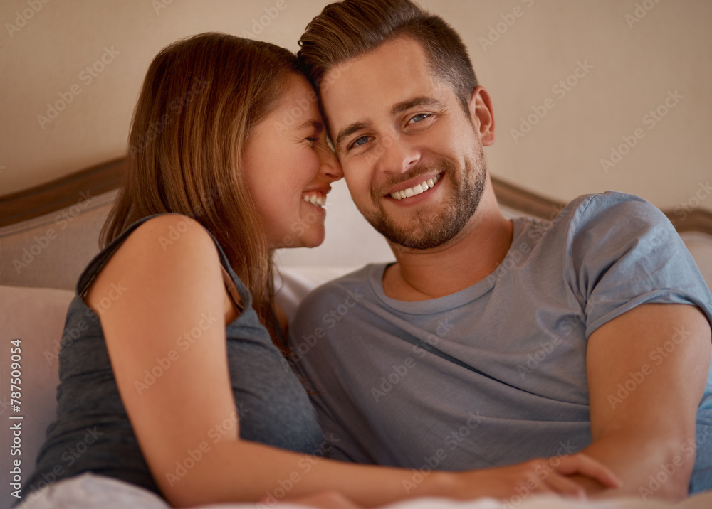 Happy, hug and portrait of couple on bed for bonding, loving relationship and relax in home for commitment. Marriage, love and man and woman in bedroom embrace, cuddle and rest on weekend morning Happy, hug and portrait of couple on bed for bonding, loving relationship and relax in home for commitment. Marriage, love and man and woman in bedroom embrace, cuddle and rest on weekend morning