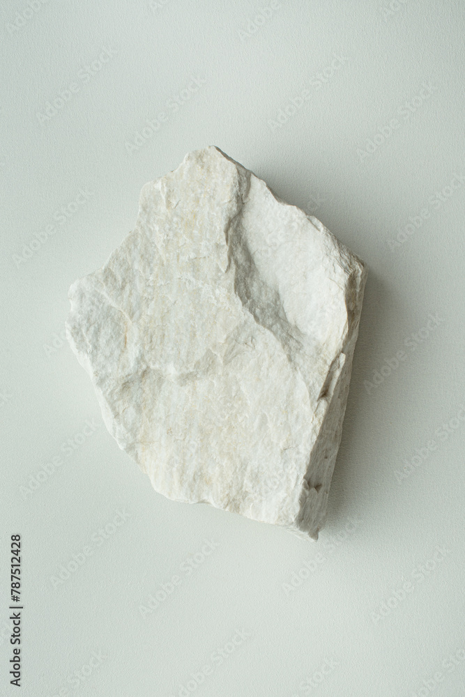 white stone on a white background with shadow white stone on a white background with shadow