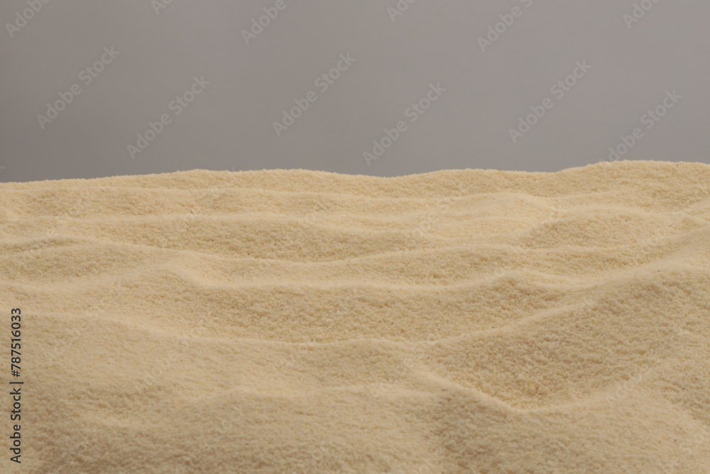 Obraz premium Wave beige sand background. Minimal empty display product presentation scene.