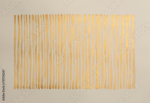 Gold bronze glitter ink watercolor wave line strip stain blot on beige grain paper texture background. © Liliia